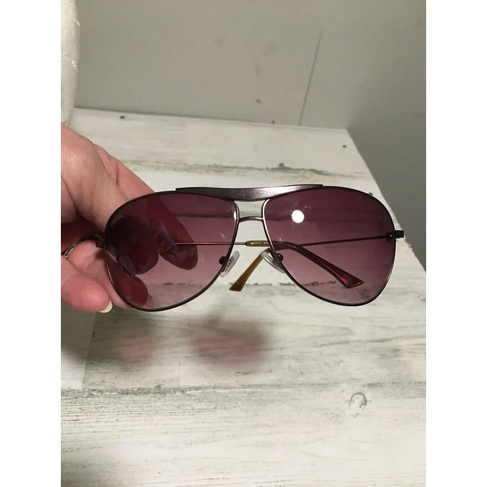Fossil unisex aviator sunglasses with dark brown lenses and bronze frames